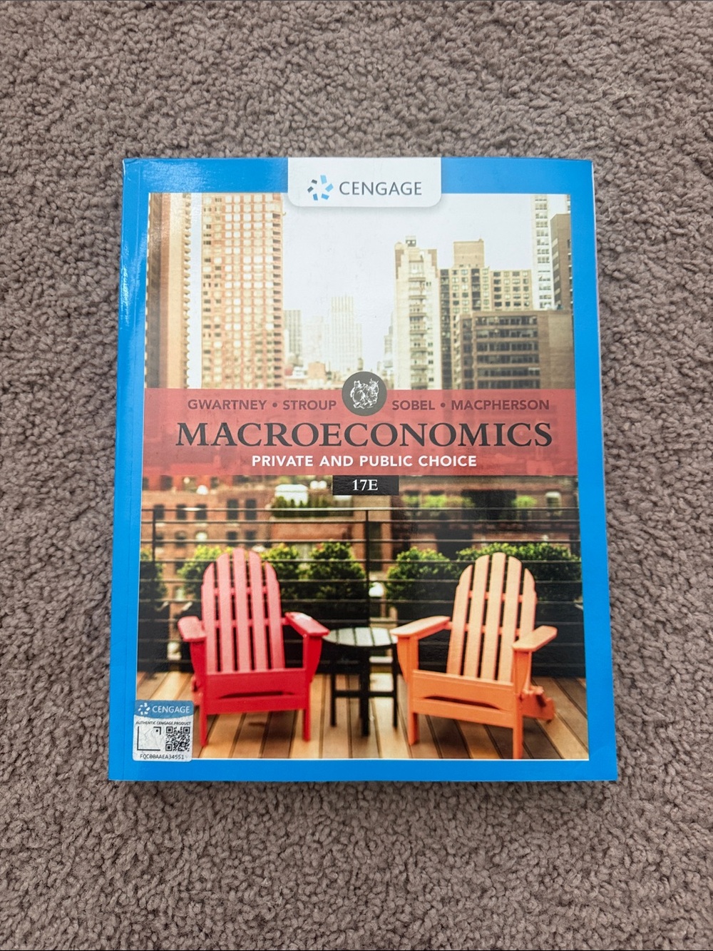 Cengage Macroeconomics Textbook - Blue Cover with Red & Orange Chairs